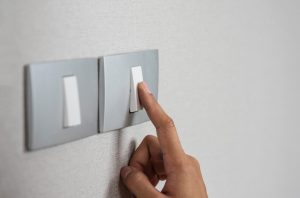 turning off light switch to save energy